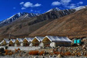 white canopy tents near mountain