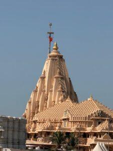 Stunning view of Somnath Temple showcasing intricate Indian architecture under a clear blue sky.